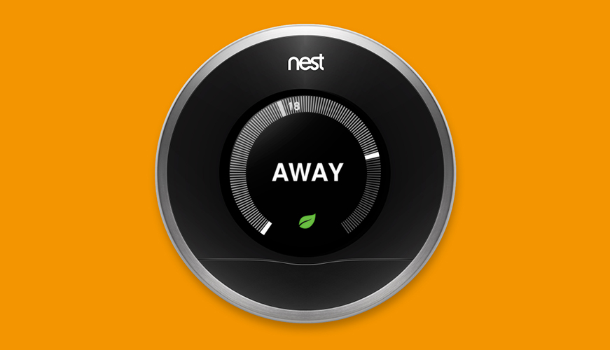 A smart thermostat displaying the word AWAY on its screen against an orange background. The device has a circular shape with a sleek black and silver design, and a small green leaf icon is visible at the bottom of the display.